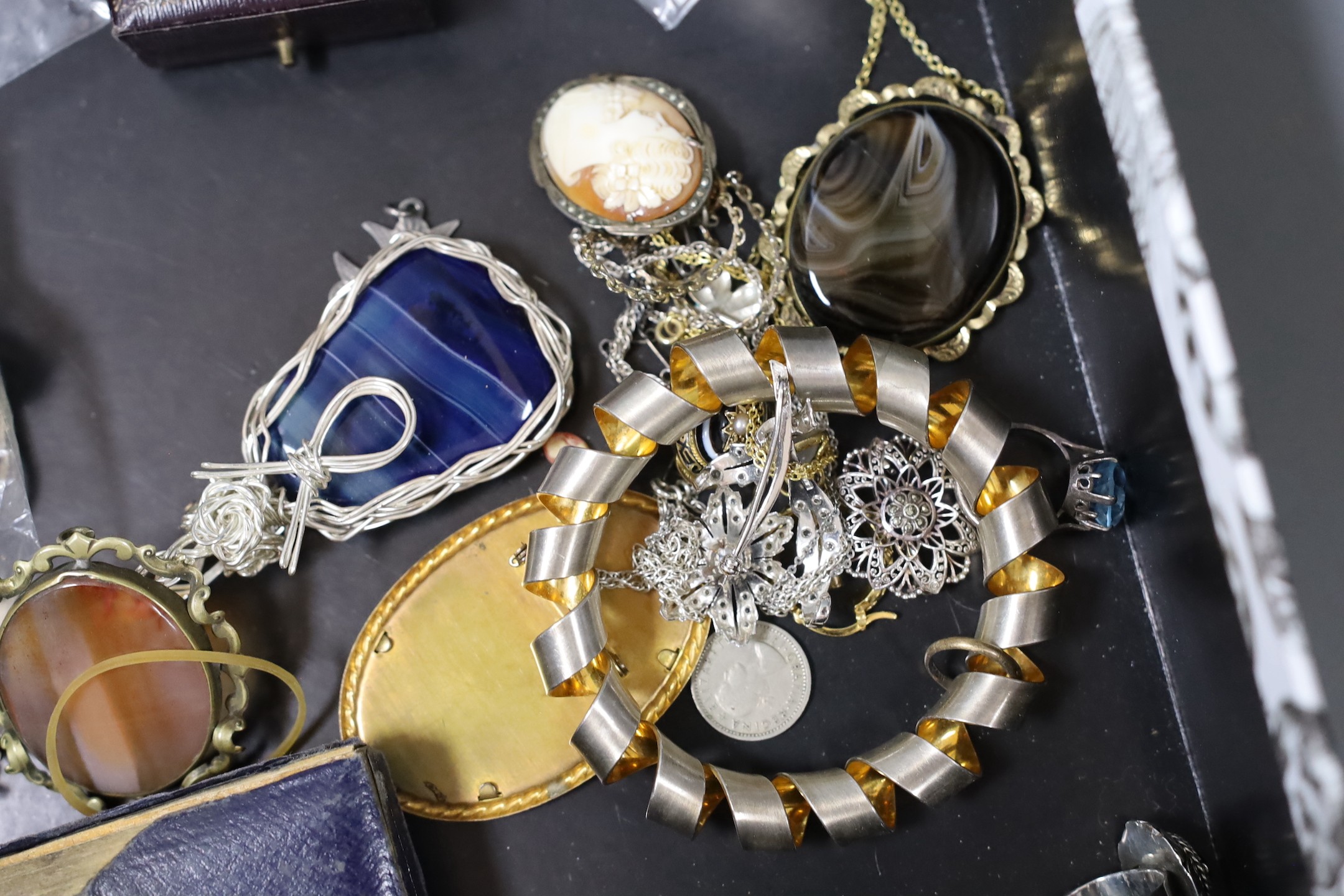 Mixed costume jewellery and other items including silver charm bracelet and silver and enamel baby brooch, Maundy money and a silver mounted dwarf candlestick.